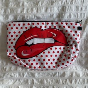Cosmetic bag with red mouth